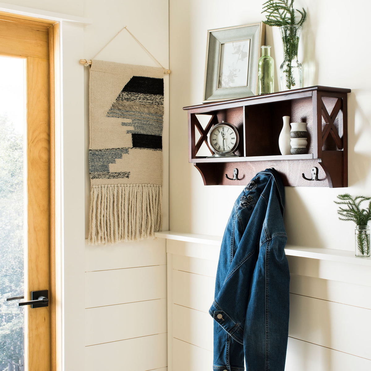 Cherry-toned wall rack adds open storage for decor and hooks for coats in an entryway. || HAC5703A || front_angle_room
