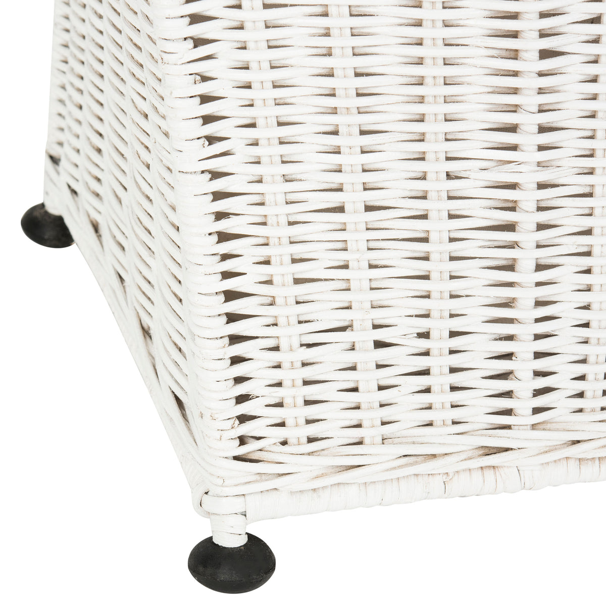 A woven white base rises above round black feet on this rattan laundry basket. || HAC6002A || leg_studio