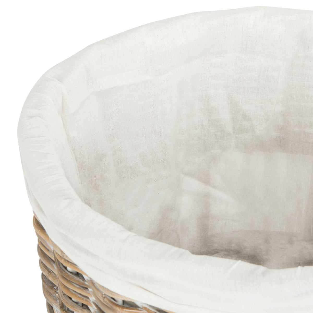 Soft white fabric lines the roomy interior of the woven rattan hamper. || HAC6500A || storage_open_studio