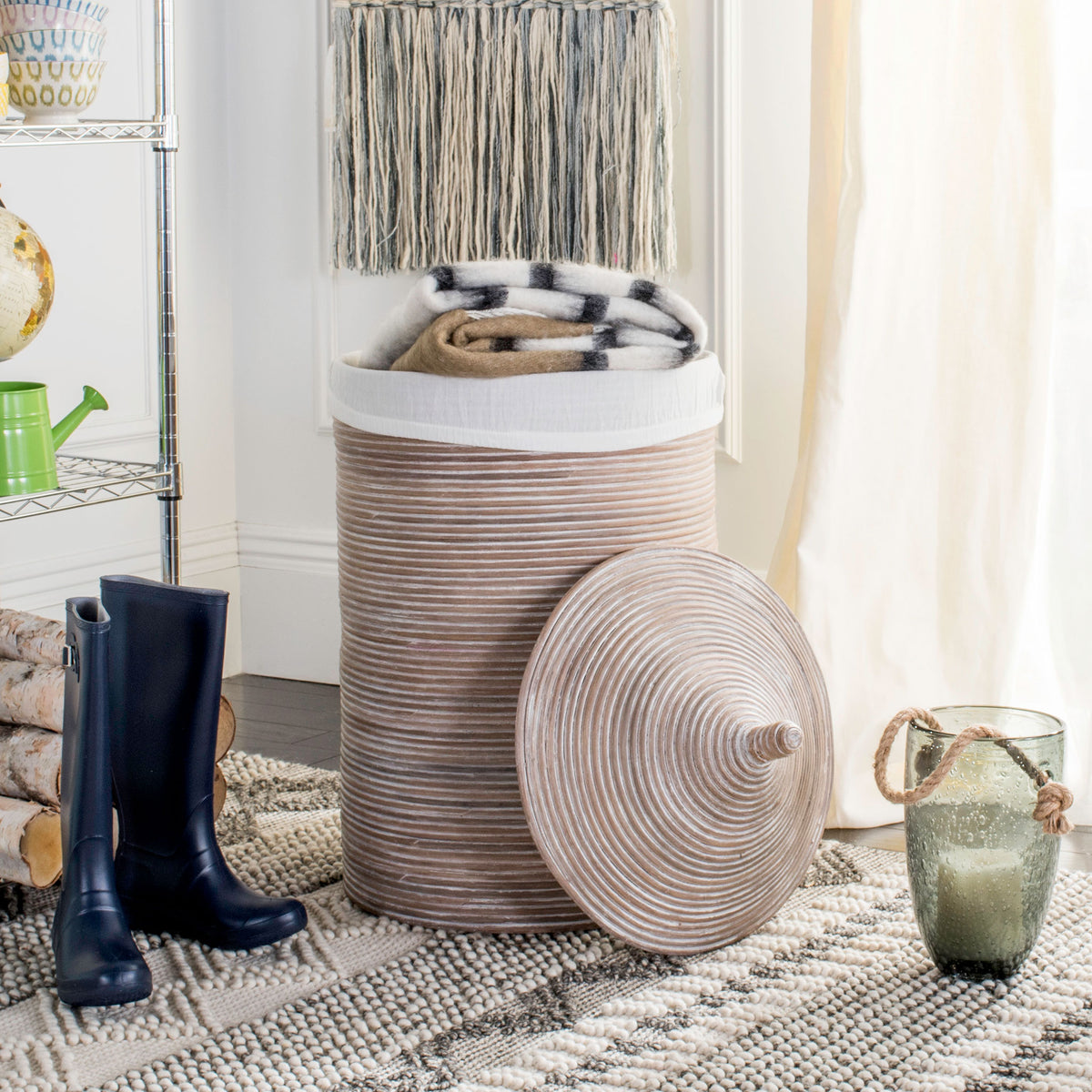 Whitewashed rattan hamper holds cozy blankets beside its removable woven lid || HAC6501A || front_open_room