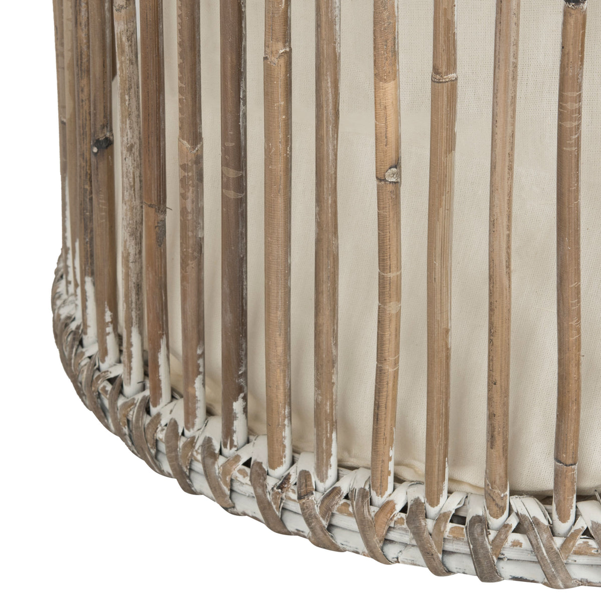 Whitewashed rattan reeds and wrapped weaving add rustic texture to the hamper base || HAC6502A || leg_studio