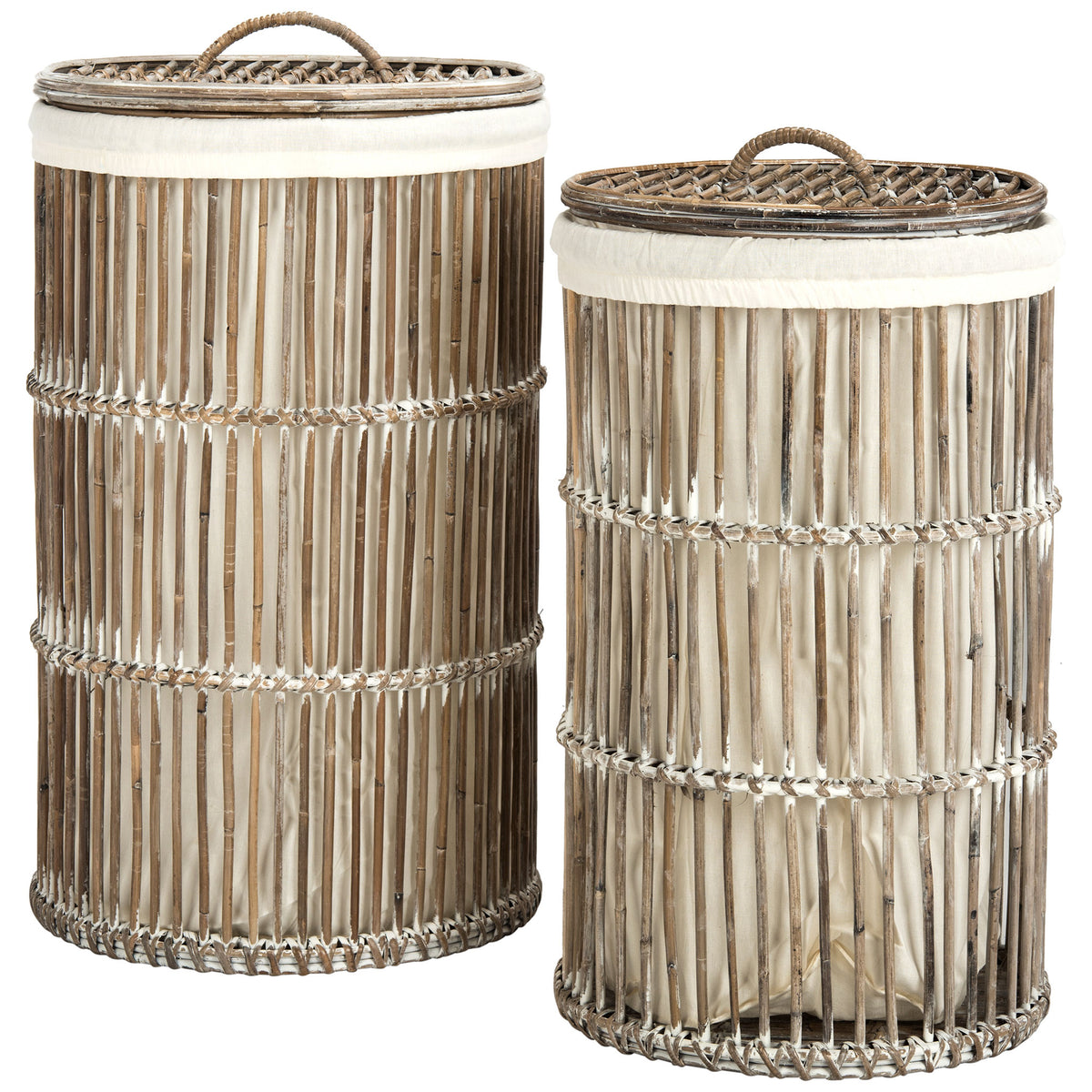 Two whitewashed rattan hampers in complementary sizes feature woven lids and soft white fabric trim || HAC6502A || front_studio