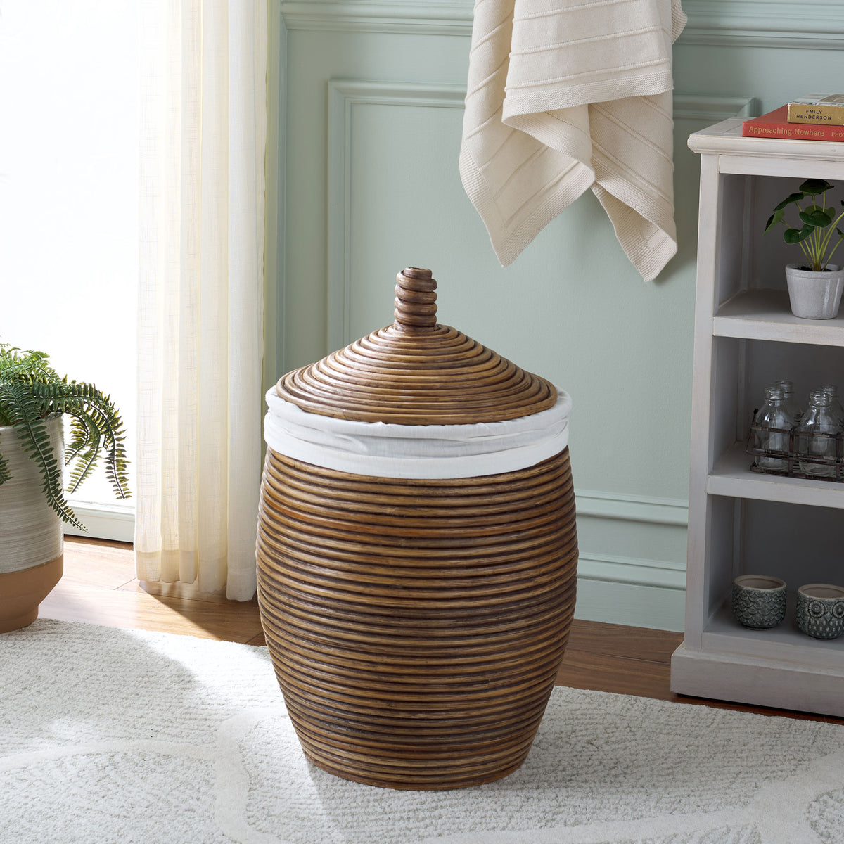 Natural rattan texture and a sculpted lid lend warmth to a softly colored room || HAC6503A || front_room