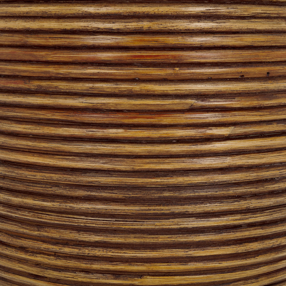 Honey-brown rattan shows rich grain and darker accents along each coil || HAC6503A || swatch_studio