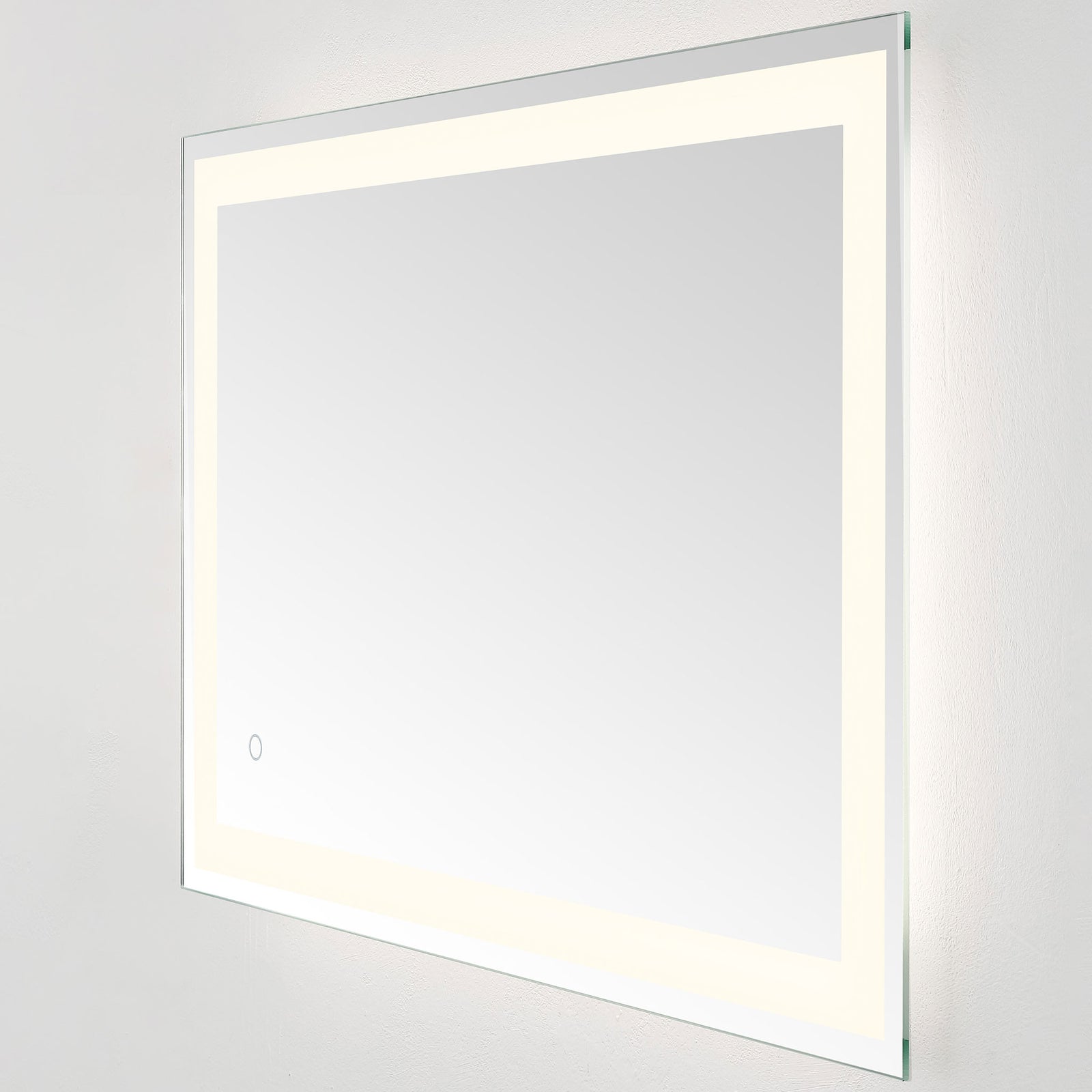 Soft white illumination lends the wide rectangular mirror a gentle, modern glow || LMR1000A || front_angle_on_studio