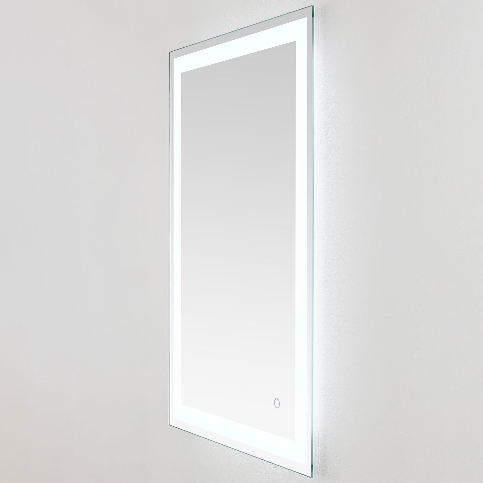 Cool-white LEDs outline the tall mirror and accent its slim, wall-mounted profile || LMR1000A || front_angle_on_studio
