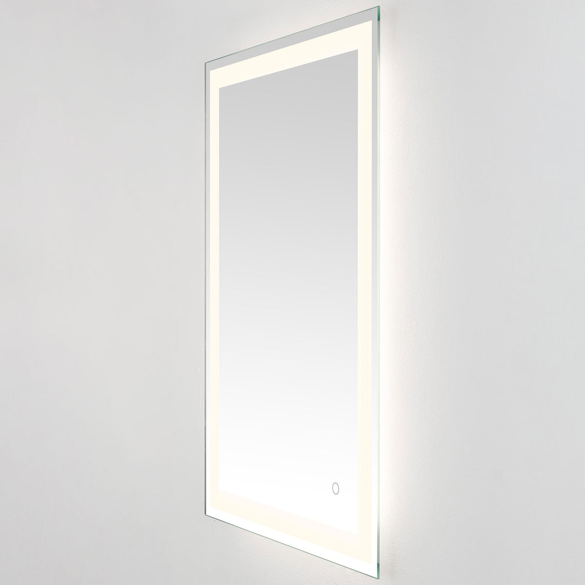 A gentle white glow surrounds the tall mirror, balanced by a sleek silver edge || LMR1000A || front_angle_on_studio
