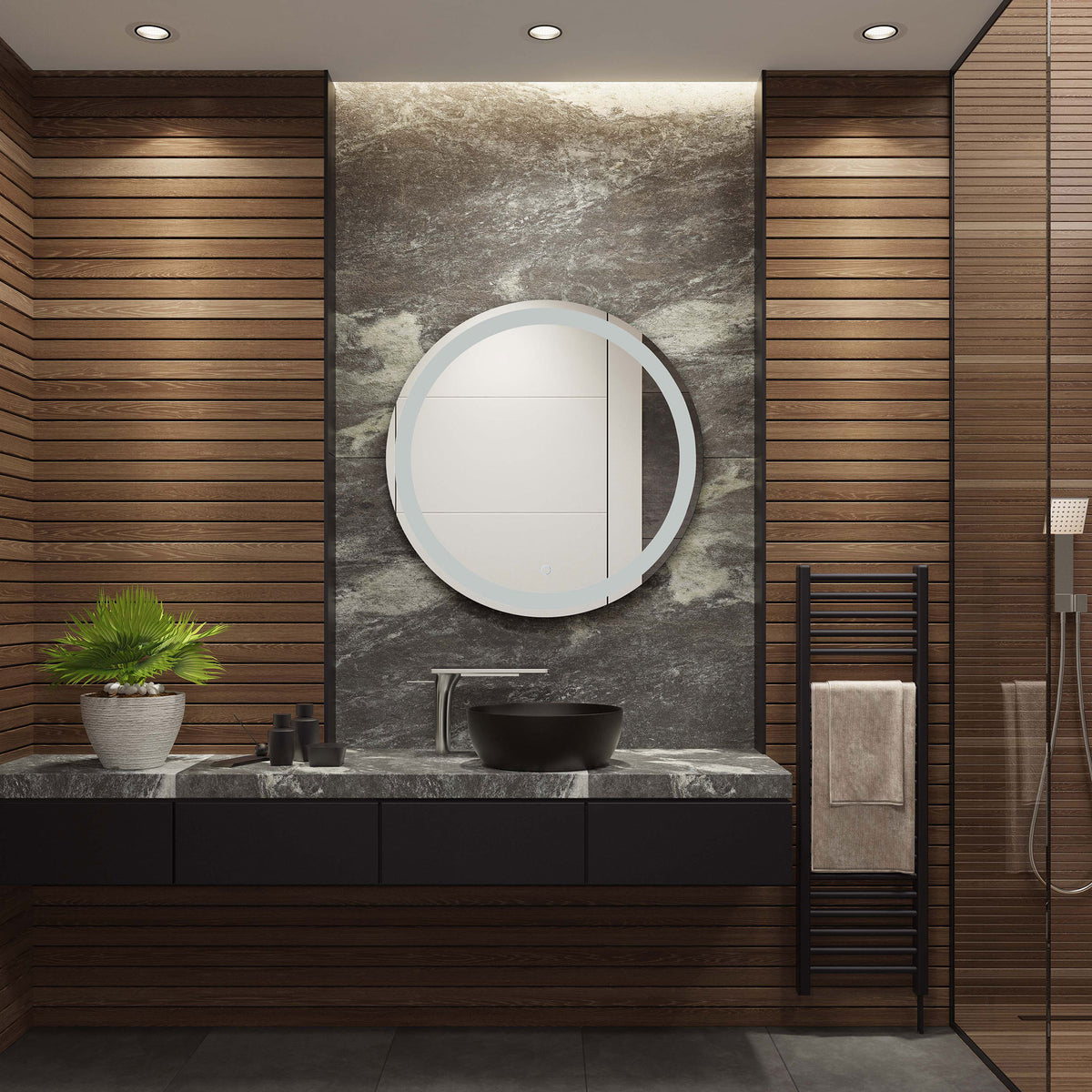 A round silver-edged mirror adds a sleek focal point above a dark stone bathroom vanity || LMR1001A || front_room