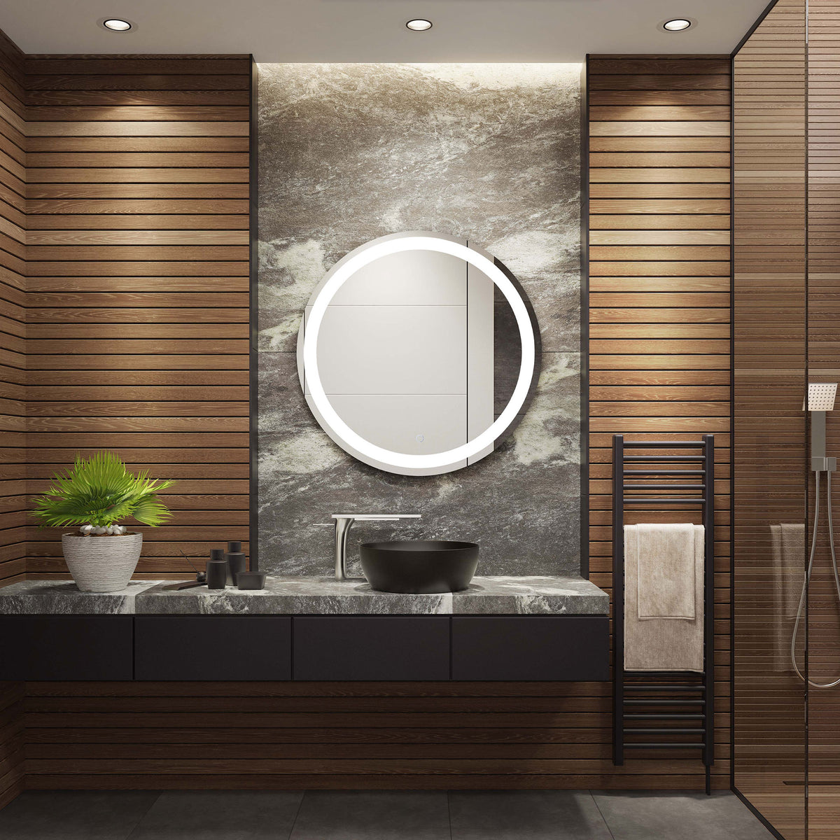 A brilliant white LED halo brightens the round mirror above a dark stone bathroom vanity || LMR1001A || front_on_room