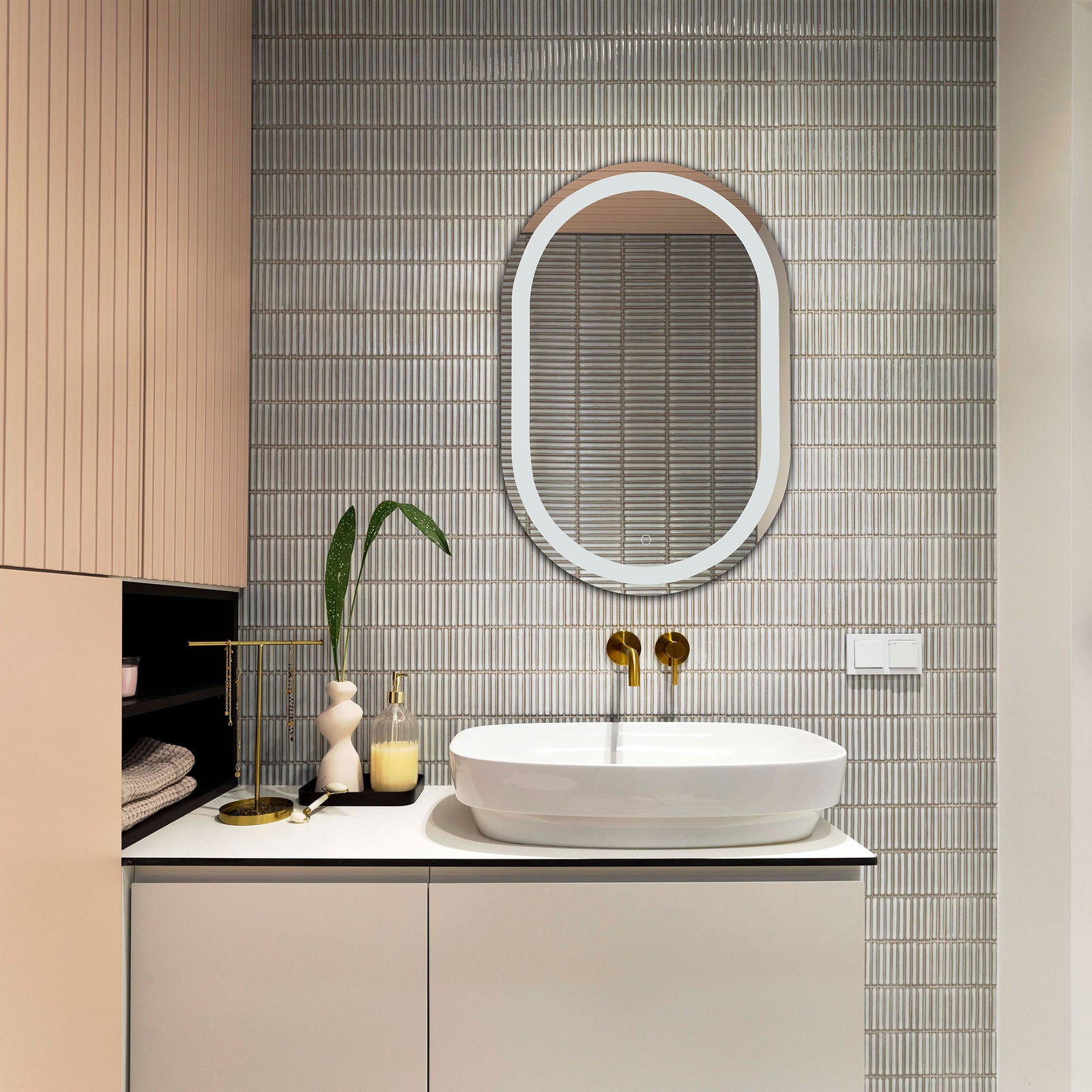 Rounded silver LED mirror lends a clean modern accent above a tiled bathroom vanity || LMR1002A || front_room