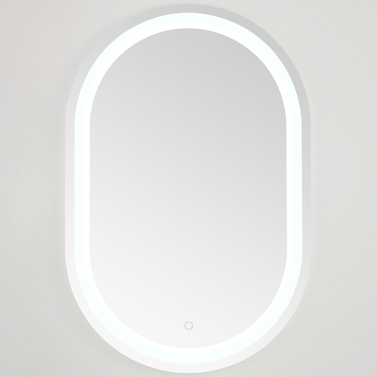 Crisp white LED light outlines the elongated mirror, with a touch control near the base || LMR1002A || front_on_studio