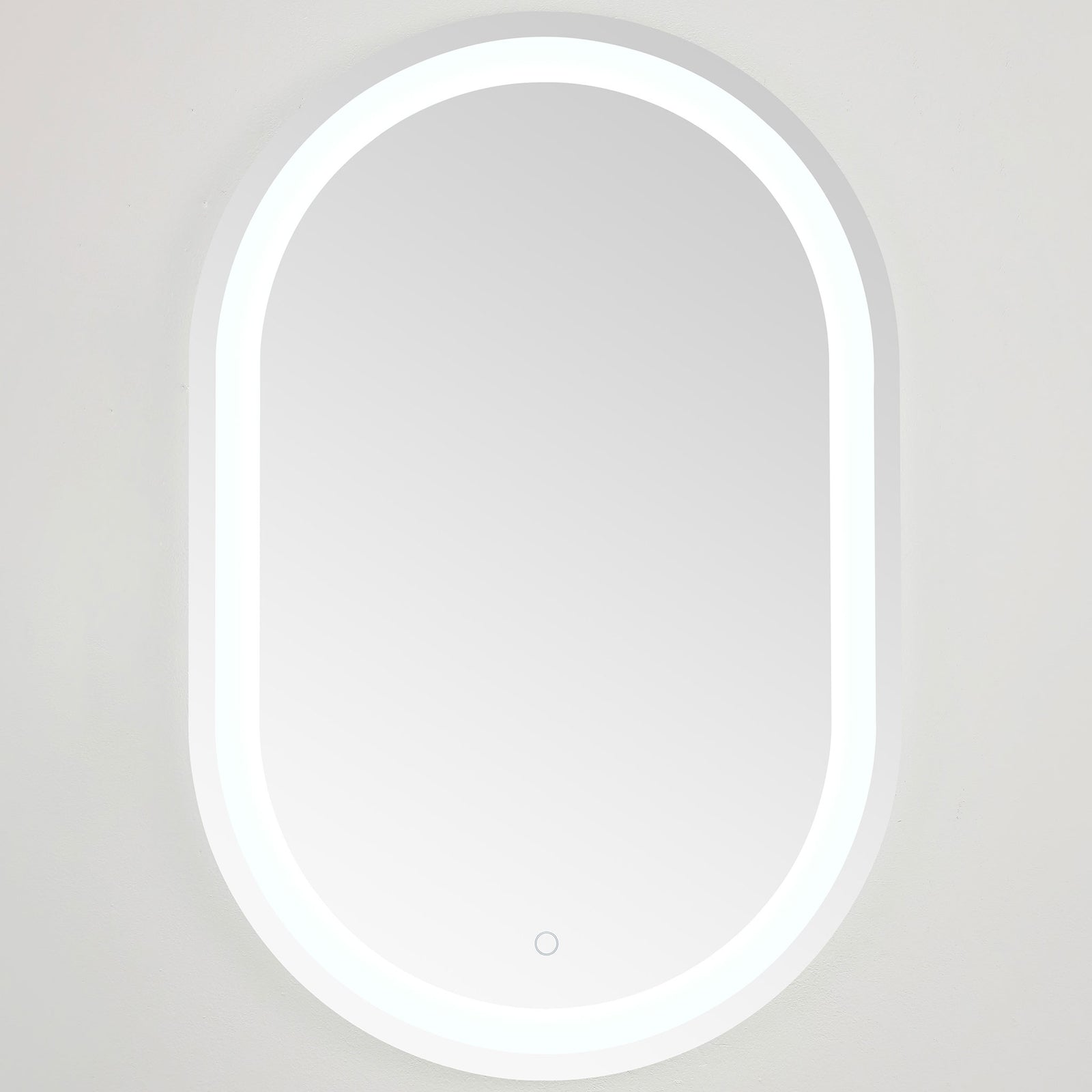 Crisp white LED light outlines the elongated mirror, with a touch control near the base || LMR1002A || front_on_studio