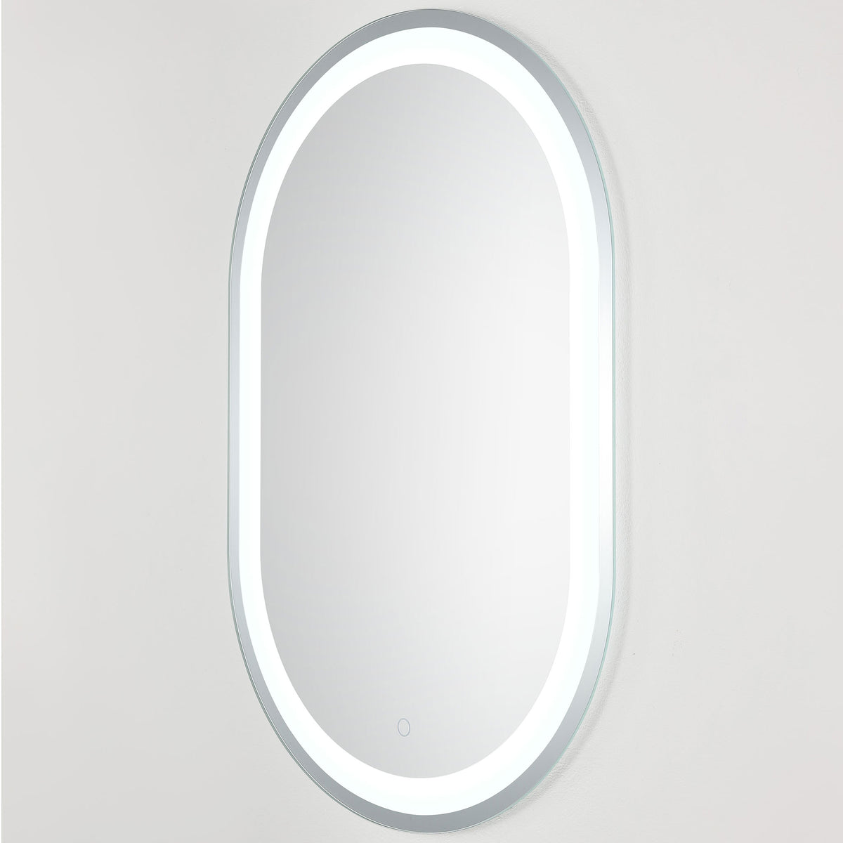 Brilliant white LED light follows the mirror's rounded shape within a slim silver frame || LMR1002A || front_angle_on_studio