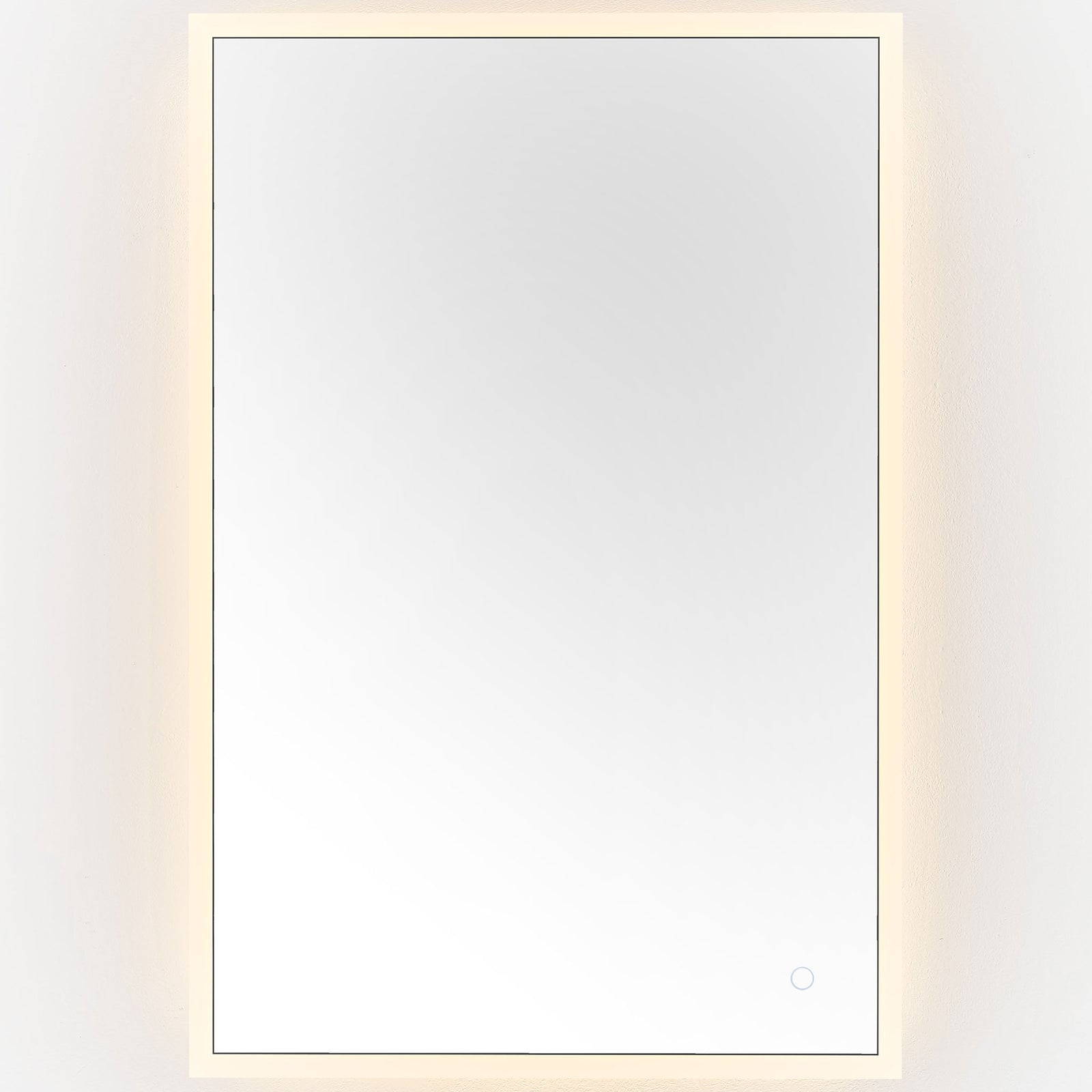A warm golden LED border lends the streamlined mirror a cozy glow. || LMR1003A || front_on_studio