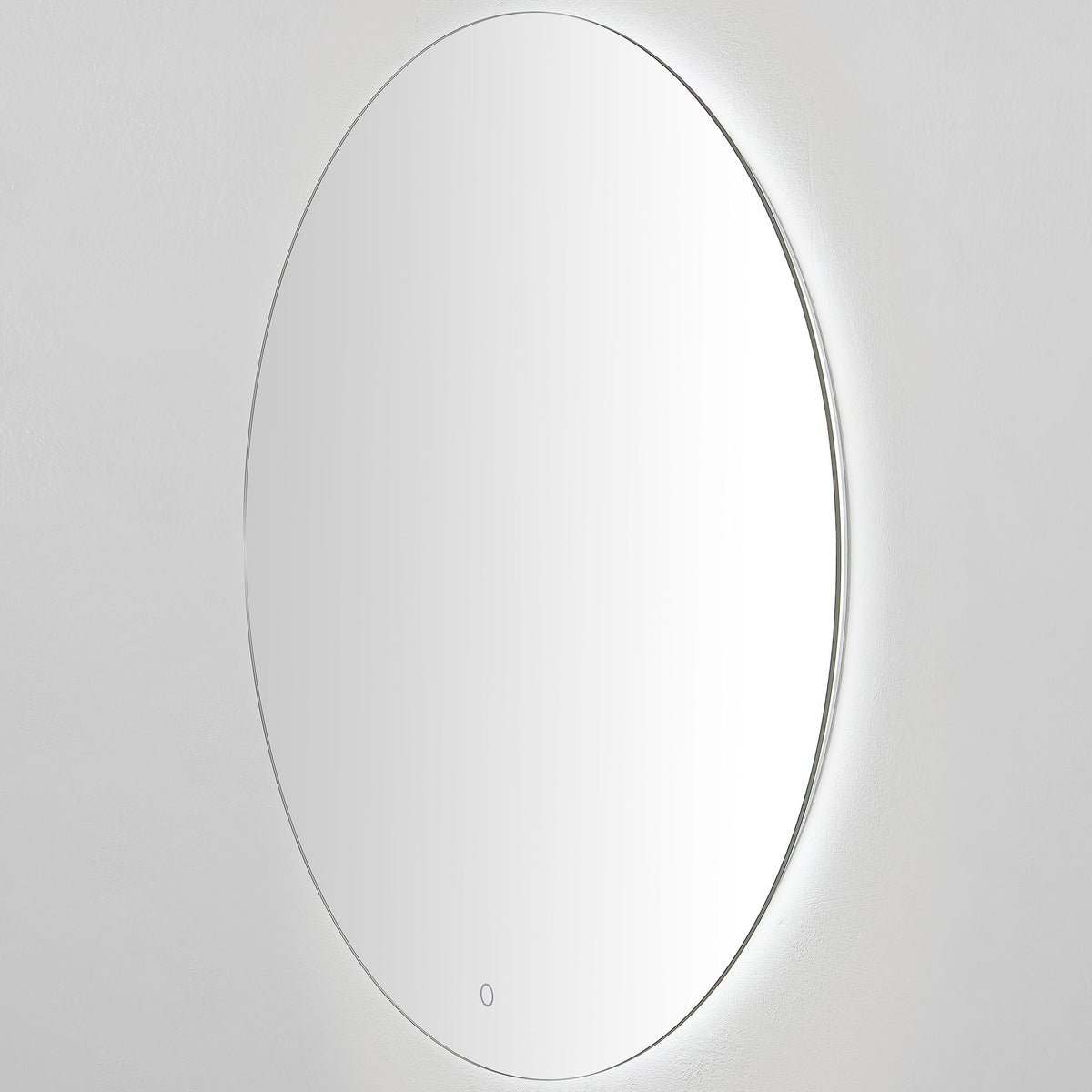 A slim circular mirror glows softly with white LED light behind its silver edge.