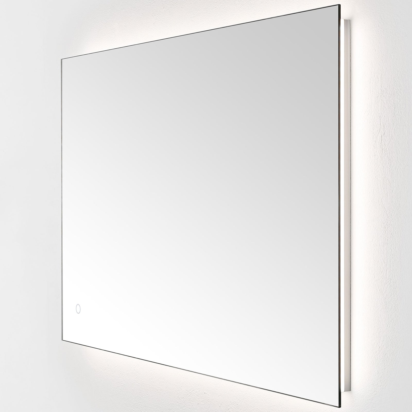 Soft white illumination highlights the wide mirror's thin profile and reflective face. || LMR1006A || front_angle_on_studio