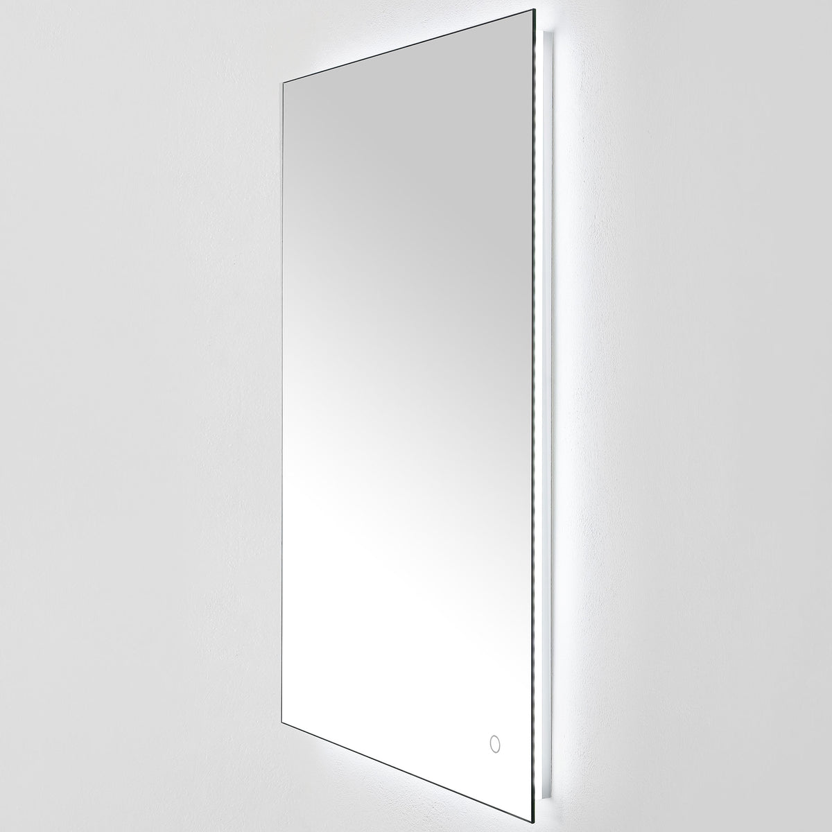 A crisp white LED glow shines from behind the tall mirror's slim reflective surface. || LMR1006A || front_angle_on_studio