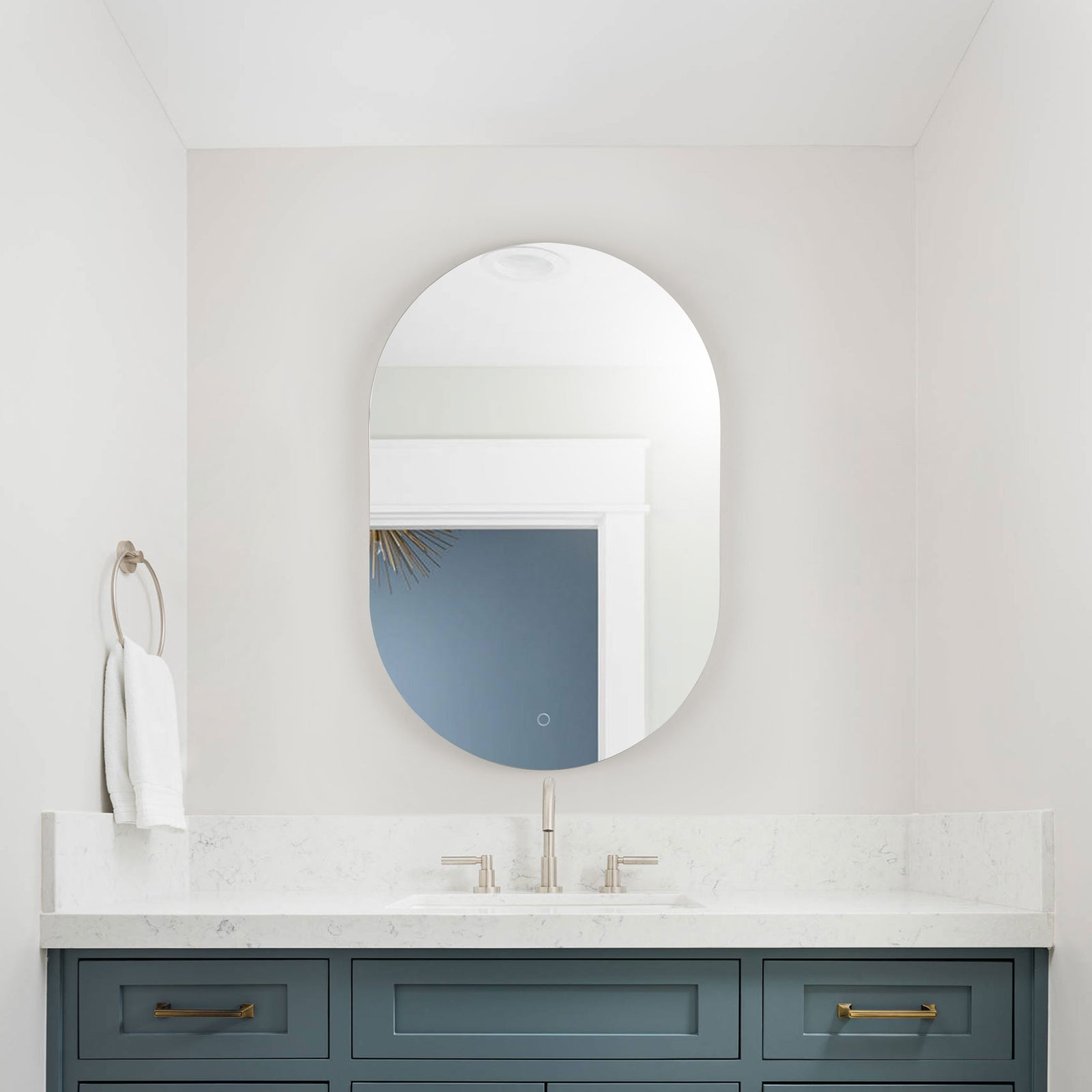 The softly rounded LED mirror brings a clean, modern accent to a bathroom vanity. || LMR1007A || front_room
