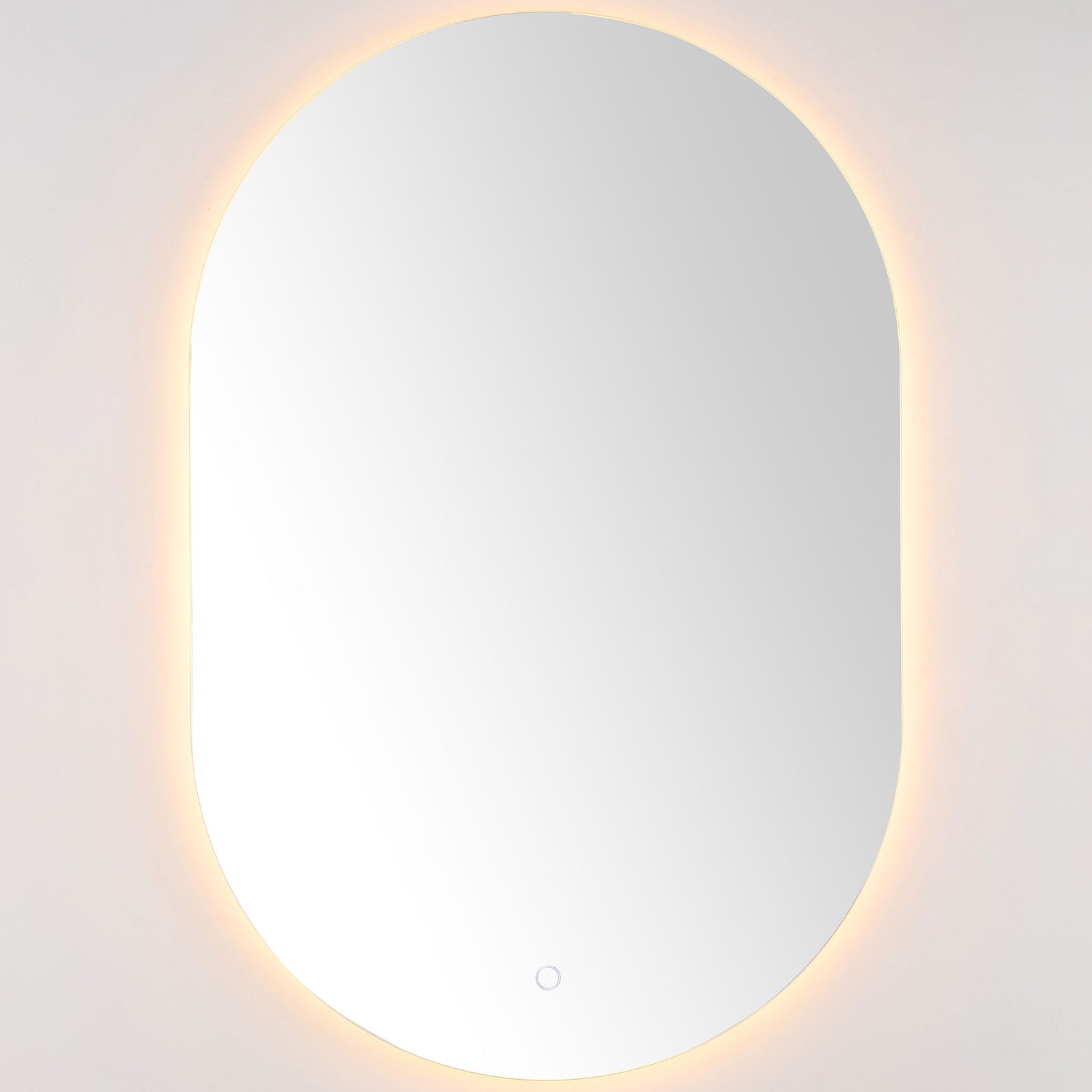 Warm LED backlighting creates a gentle halo around the rounded mirror's minimalist silhouette. || LMR1007A || front_on_studio