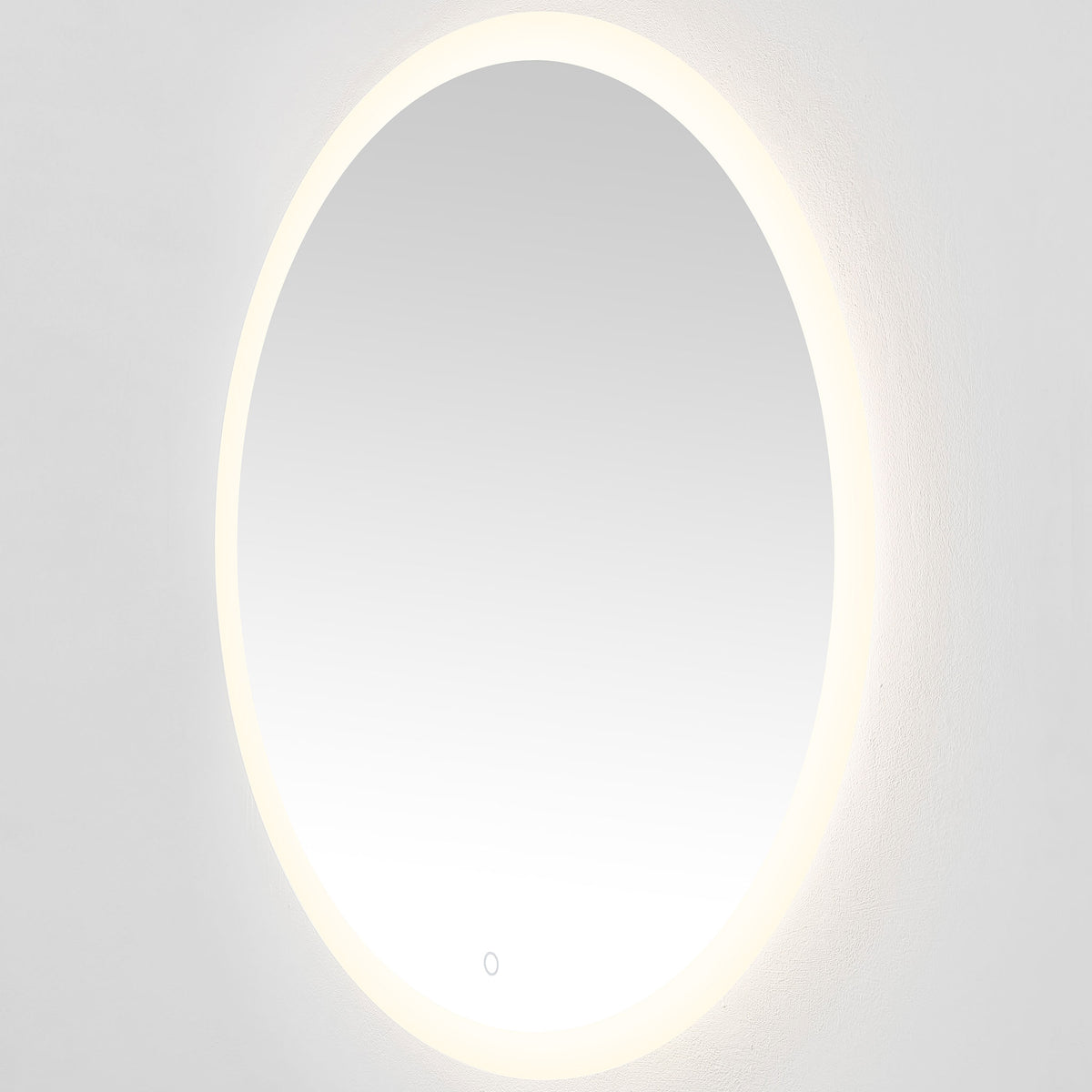 Gentle neutral-white light surrounds the round mirror and softly washes the wall. || LMR1008A || front_angle_on_studio