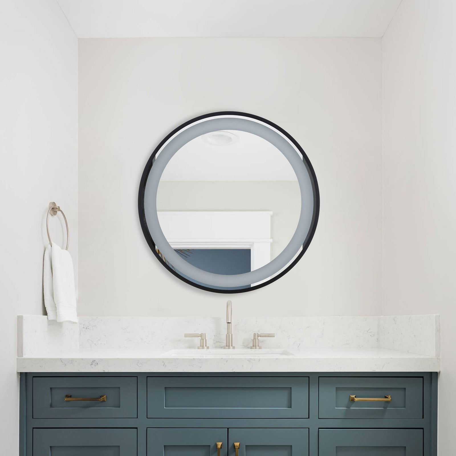 An unlit LED ring and black frame define the round mirror above a blue bathroom vanity. || LMR1010A || front_room