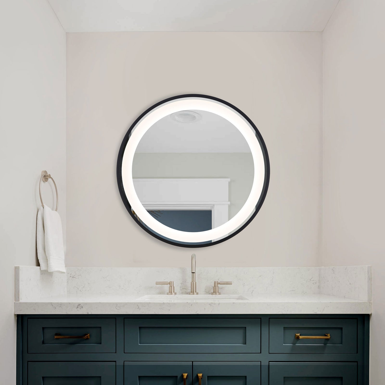 The round mirror's glowing white LED border lights the space above a blue bathroom vanity. || LMR1010A || front_on_room