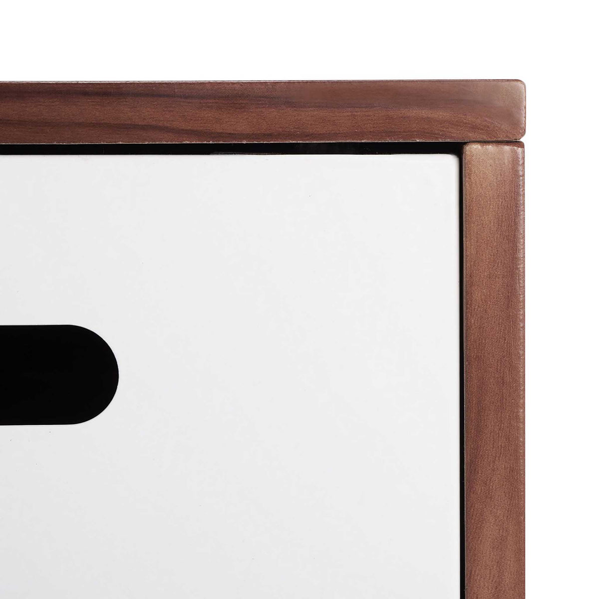 Walnut-look trim frames a smooth white slotted panel for a crisp contrast in color and texture.