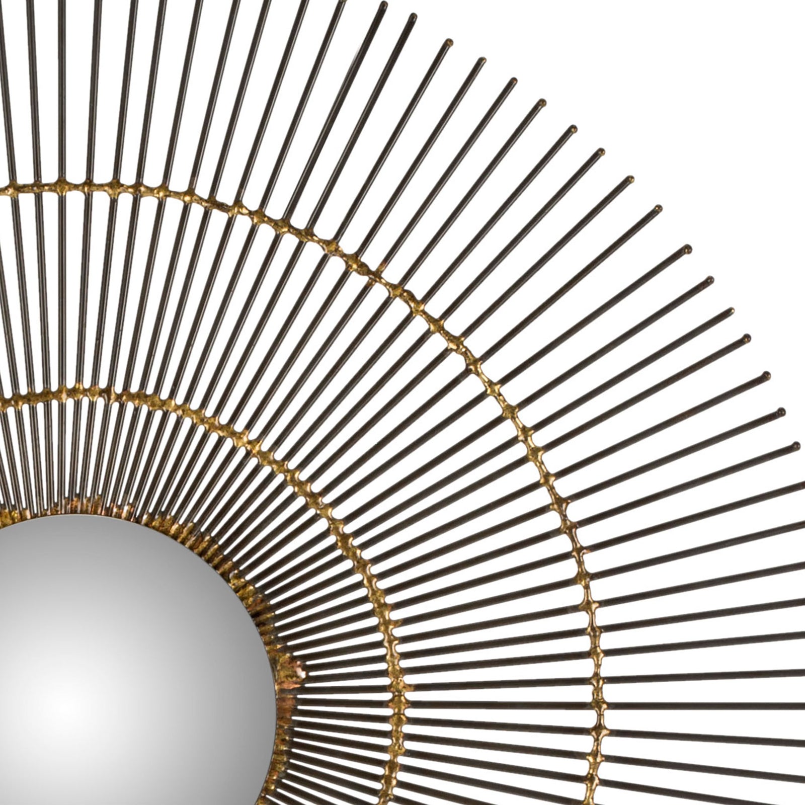 Fine metal rays radiate from a round mirror through warm gold rings. || MIR4021A || detail_studio
