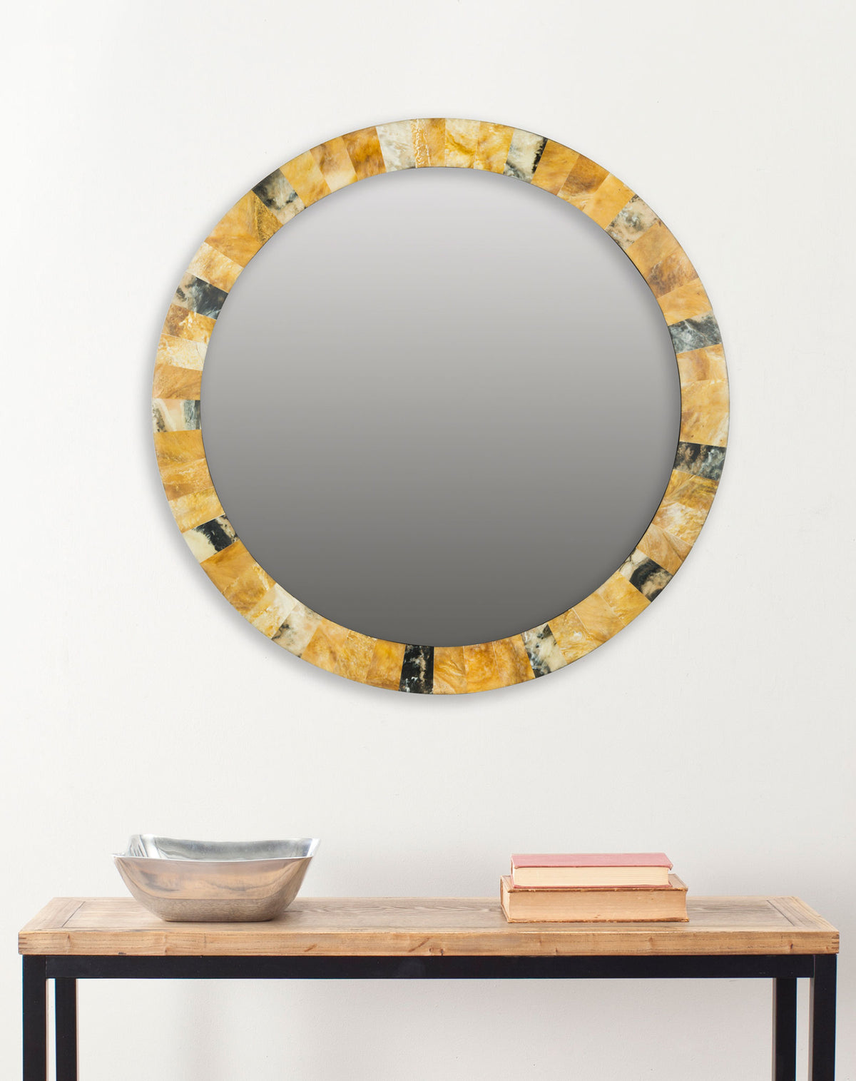 A round mirror with warm golden accents creates a focal point above a console table || MIR4051A || front_room