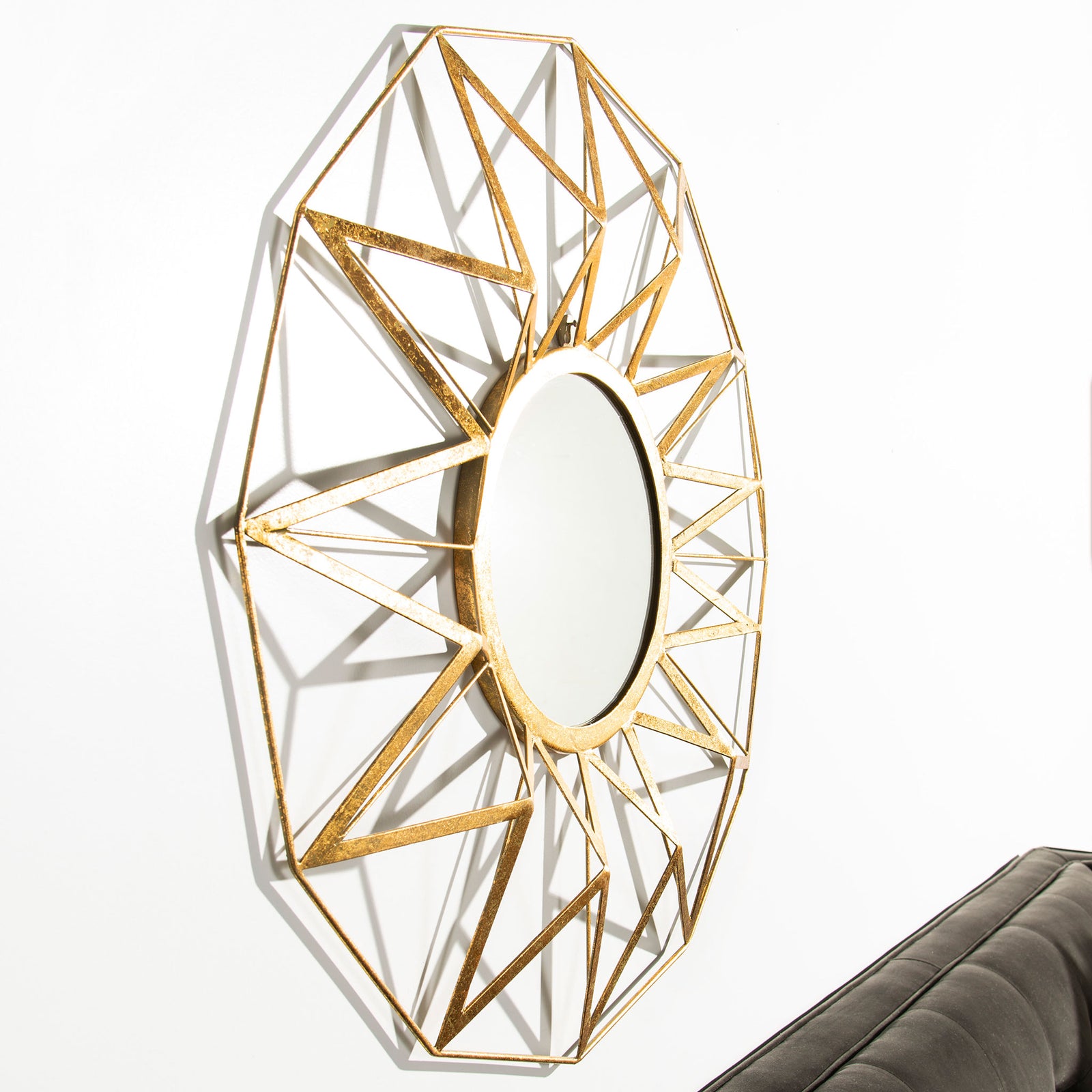 Layered gold rays extend around a circular mirror for a sculptural wall accent || MIR4099A || front_angle_room