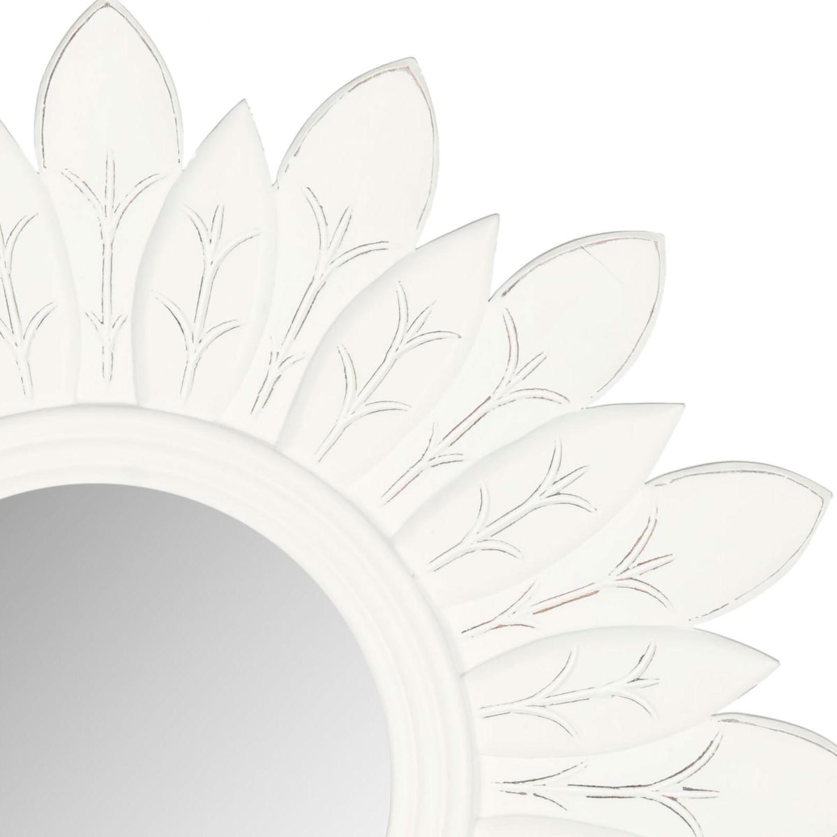 Carved white petals with delicate branch-like markings frame the round mirror