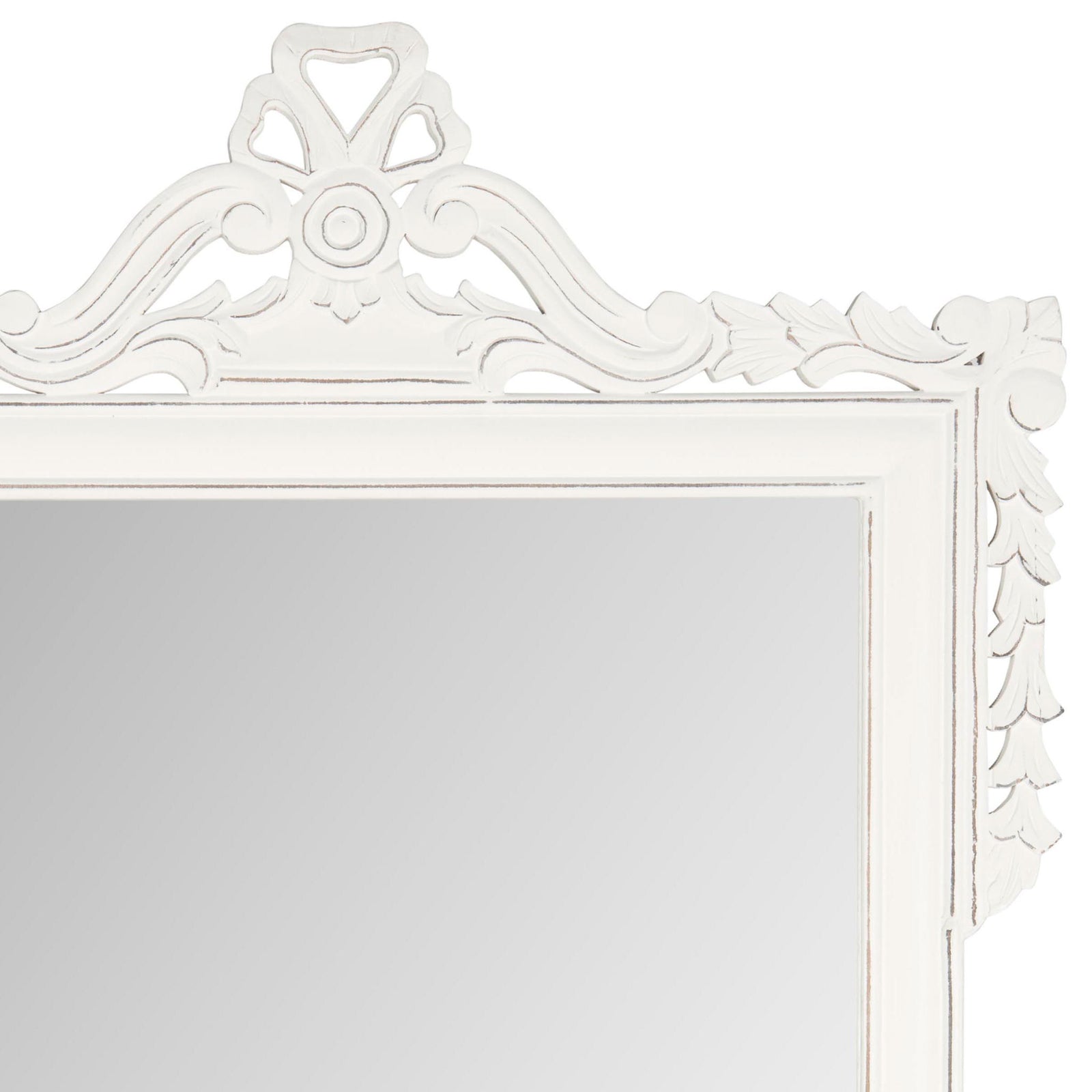 Antique white scrollwork and a carved crest add graceful detail above the mirror || MIR5004D || detail_studio