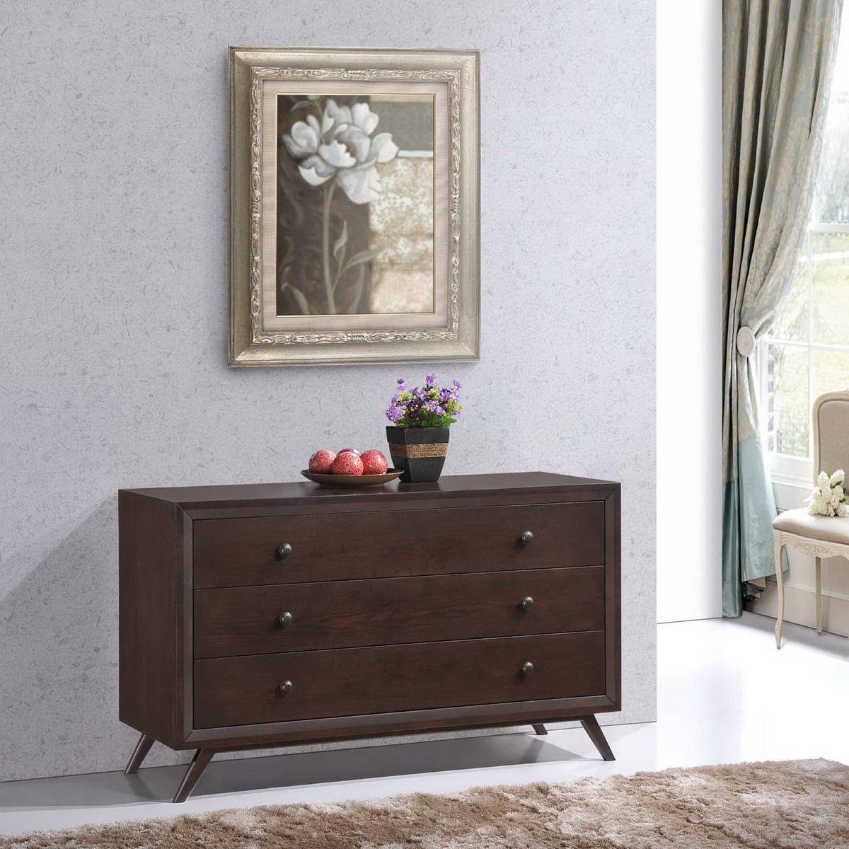 Dark wood dresser lends mid-century flair with angled legs and three roomy drawers
