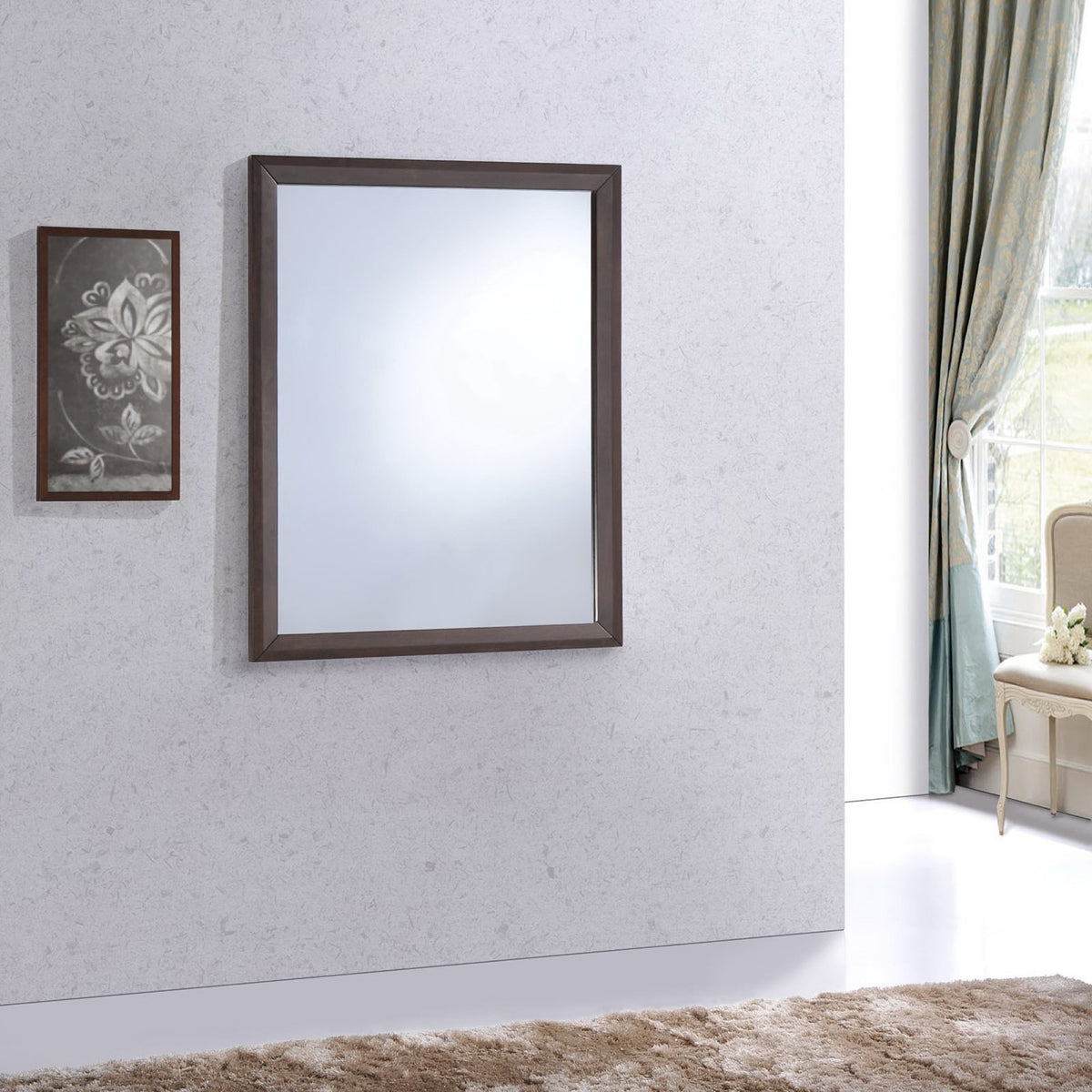 A cappuccino-framed mirror adds a crisp rectangular accent to a light-colored wall