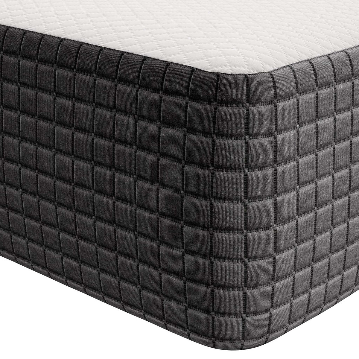 A charcoal square-quilted side curves around the mattress corner beneath its white knit top.