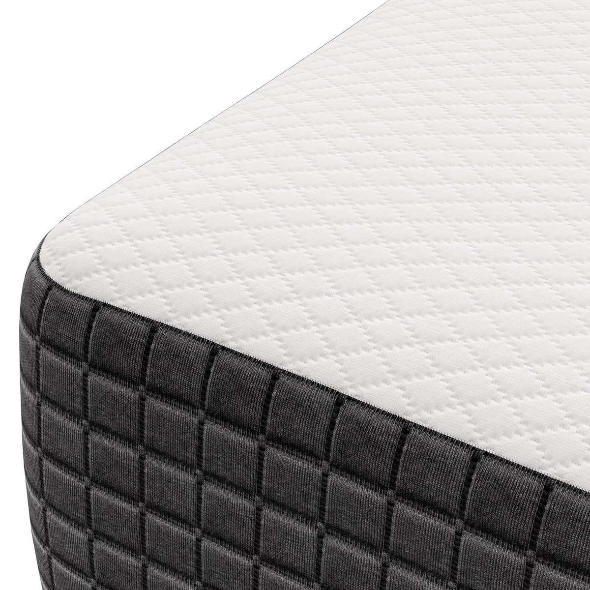 White diamond-knit quilting meets a deep charcoal square-quilted side at the mattress edge.