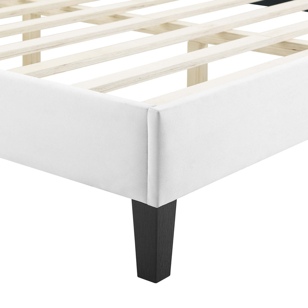 Black tapered leg and crisp, tailored white upholstered platform corner || MOD-6597-WHI || leg_studio