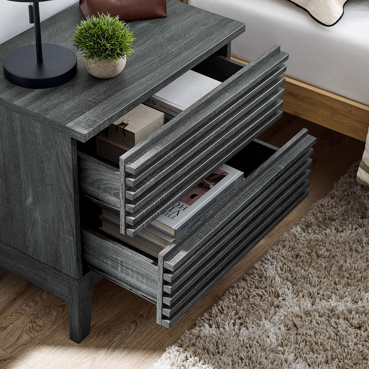 Nightstand styled beside a bed with both drawers open to show bedside storage capacity || MOD-6964-CHA || storage_open_room