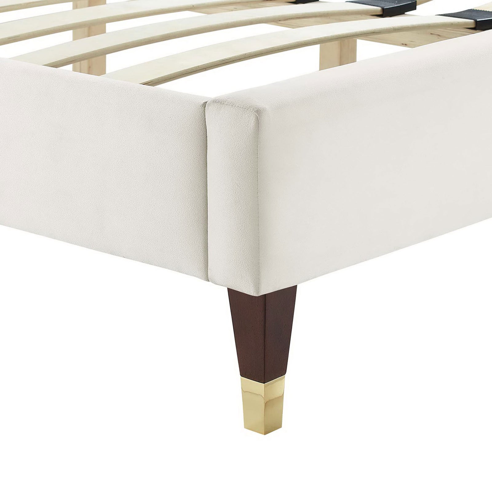 Gold-capped tapered wood leg and neatly tailored velvet upholstery at the foot rail || MOD-6971-WHI || leg_studio