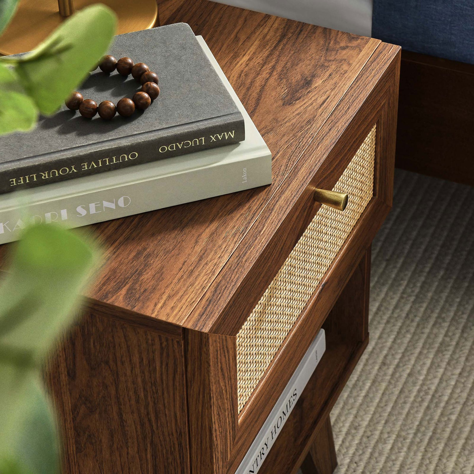 Walnut nightstand top styled with lamp and books showcases warm wood texture and cane detail || MOD-7049-WAL || detail_room