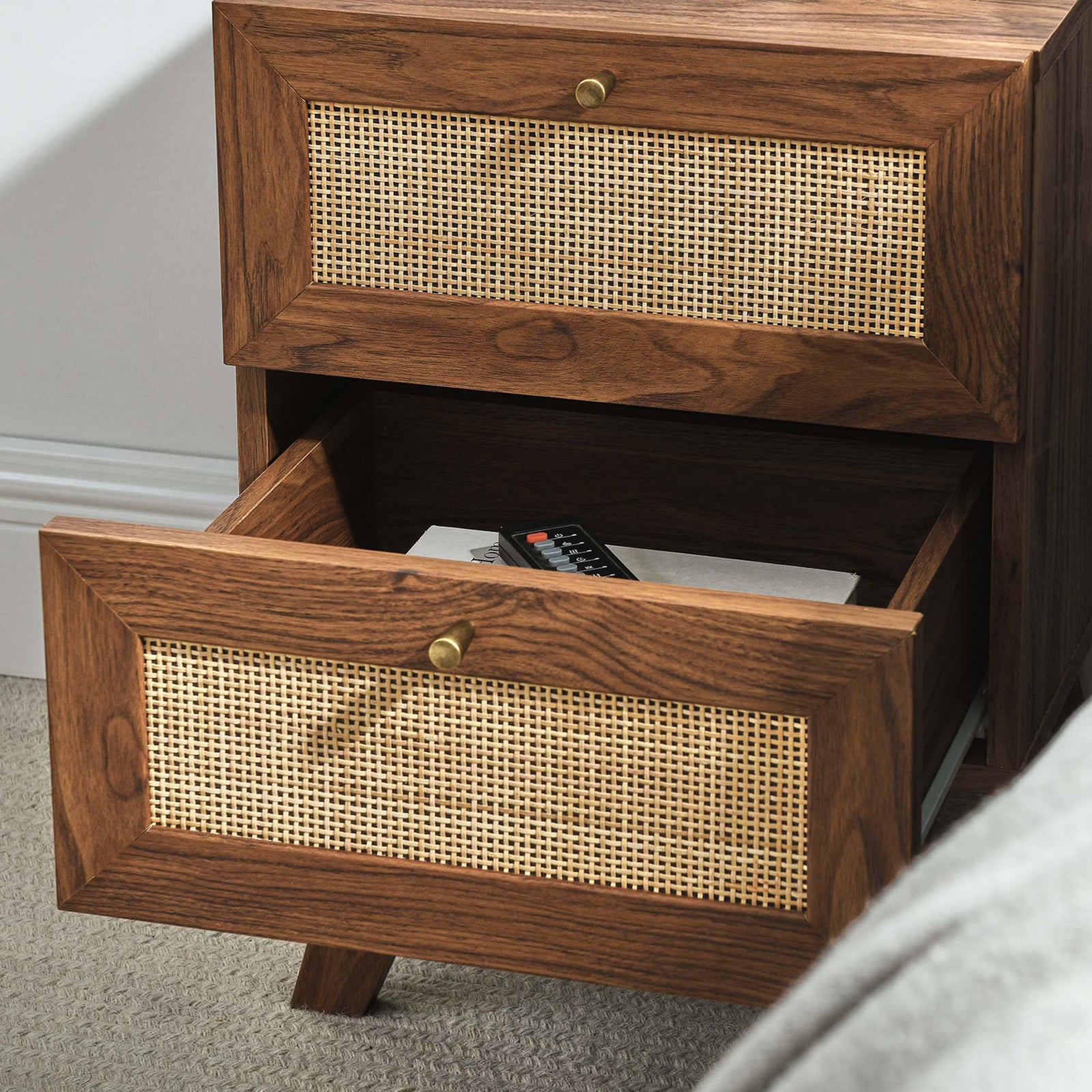 Nightstand in bedroom setting with drawer open for easy access to remotes and books || MOD-7050-WAL || storage_open_room