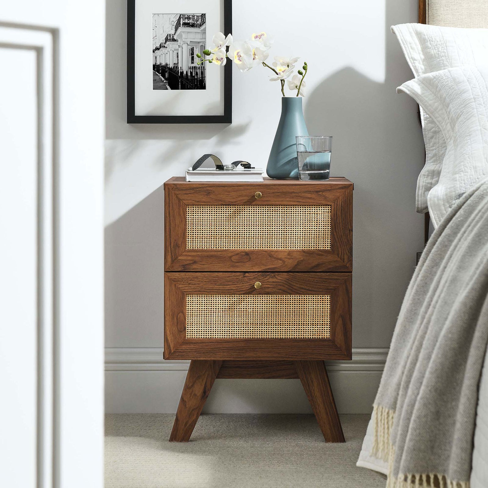 Soma nightstand styled beside a bed, topped with decor and everyday bedside essentials || MOD-7050-WAL || front_angle_room