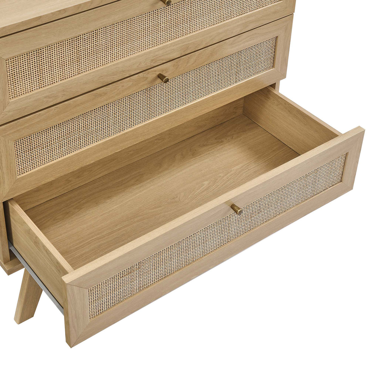 Open dresser drawer revealing spacious oak storage area with smooth interior finish and full-extension glides || MOD-7051-OAK || storage_open_studio