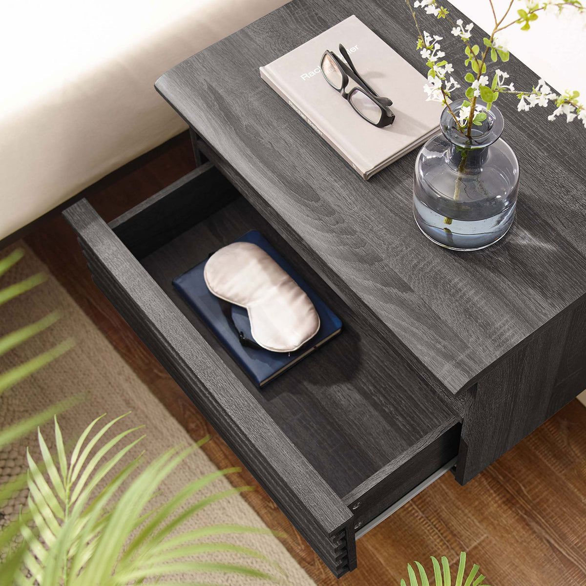 Charcoal wall mounted nightstand styled with decor and open drawer holding bedside essentials || MOD-7058-CHA || storage_open_room