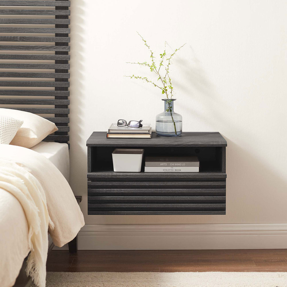 Charcoal wall mounted nightstand floating beside bed with books vase and decorative accents || MOD-7058-CHA || front_room
