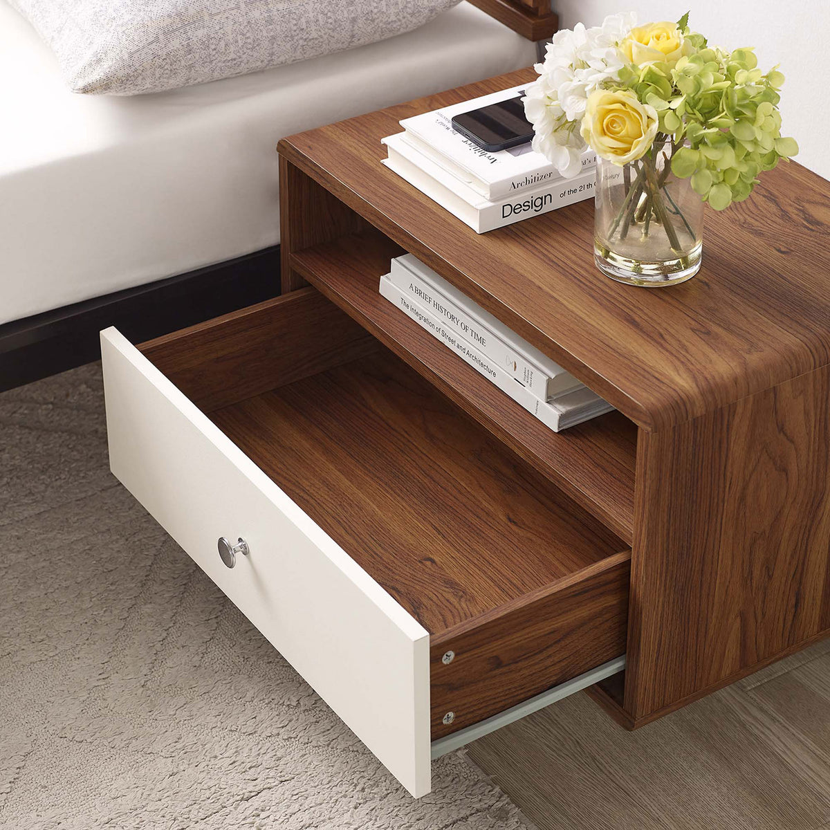 Nightstand mounted by the bed with drawer open, displaying books and decor in a cozy bedroom setting || MOD-7059-WAL-WHI || storage_open_room