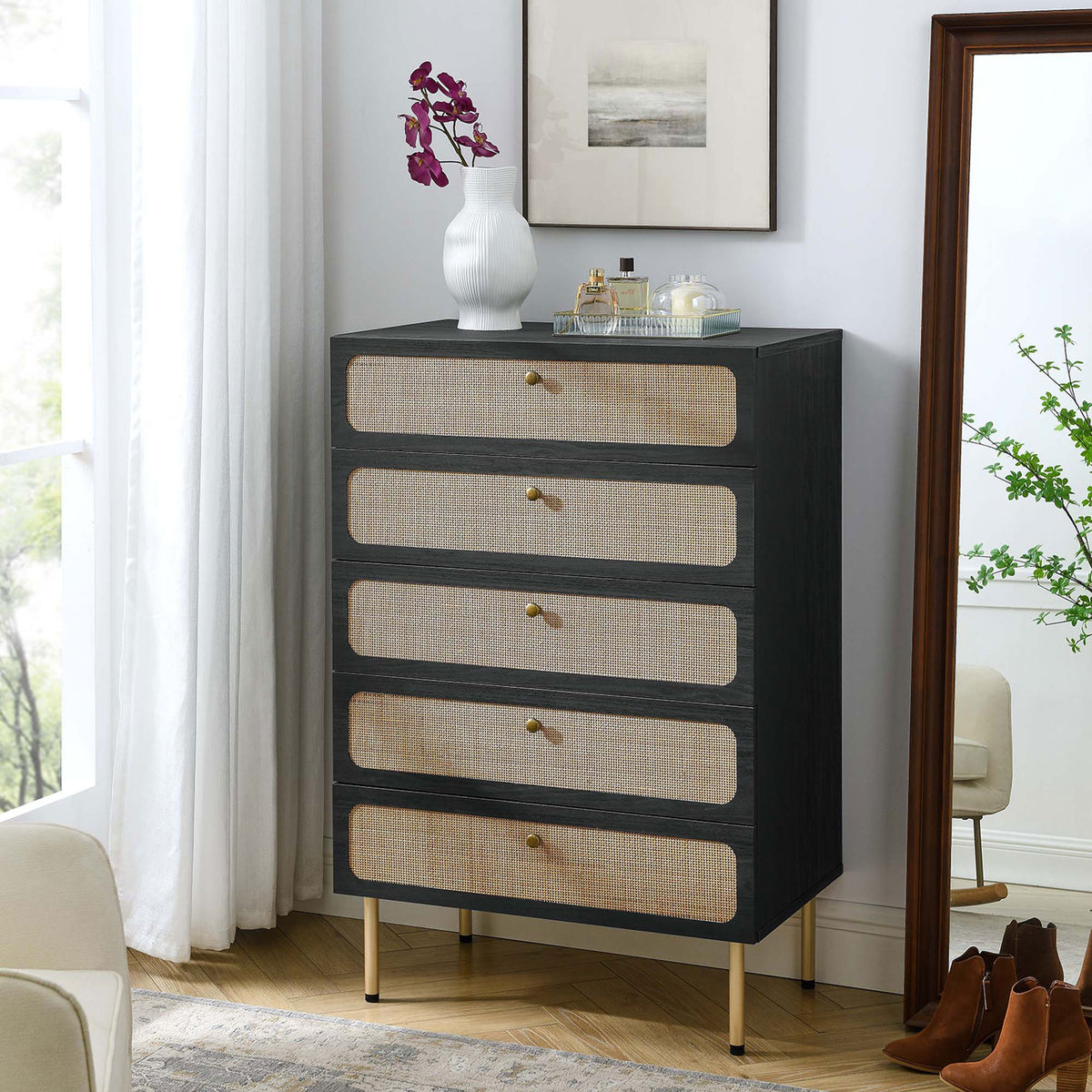 Black rattan 5-drawer chest styled in a bright bedroom with decor accents for a fresh, modern look || MOD-7065-BLK || front_angle_room