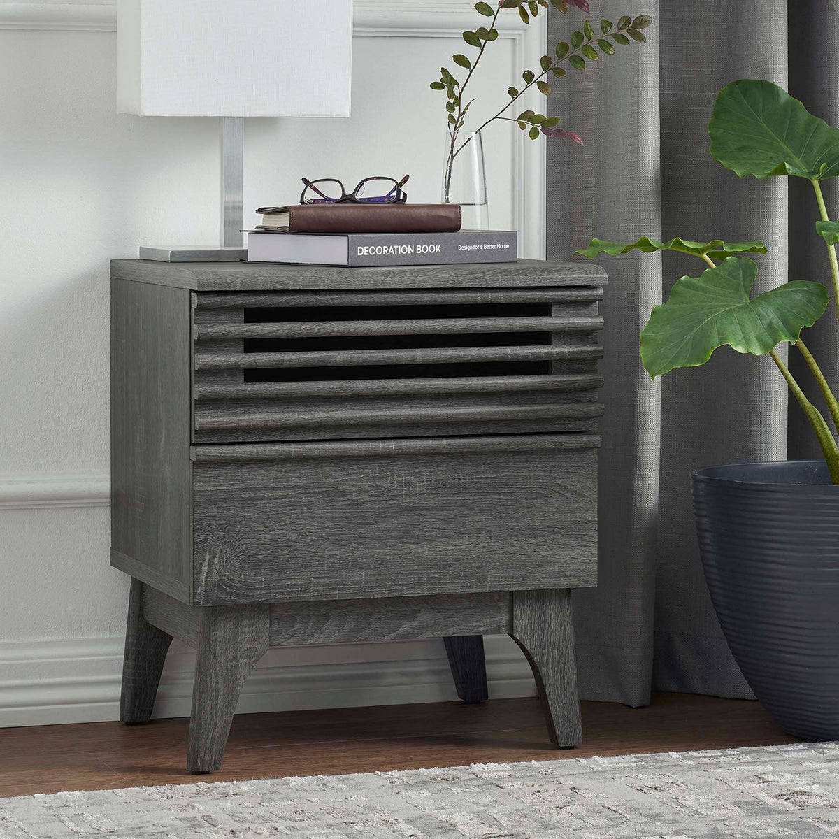 Charcoal nightstand styled in a cozy bedroom with books, lamp, and greenery for a warm modern look || MOD-7071-CHA || front_angle_room