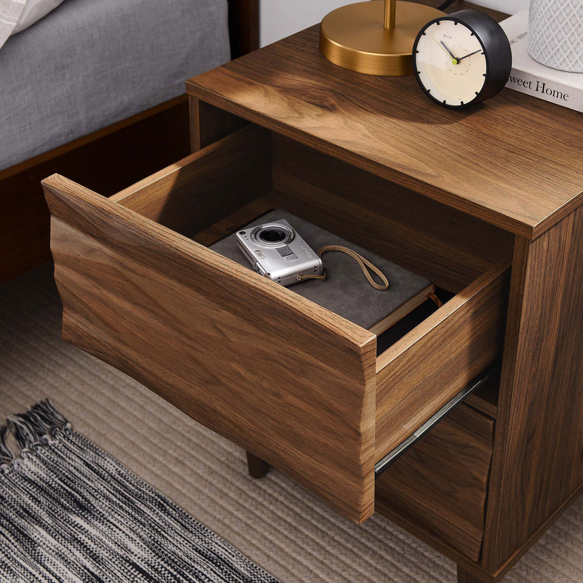 Open drawer nightstand neatly storing bedside accessories in a cozy bedroom setting || MOD-7080-WAL || storage_open_room