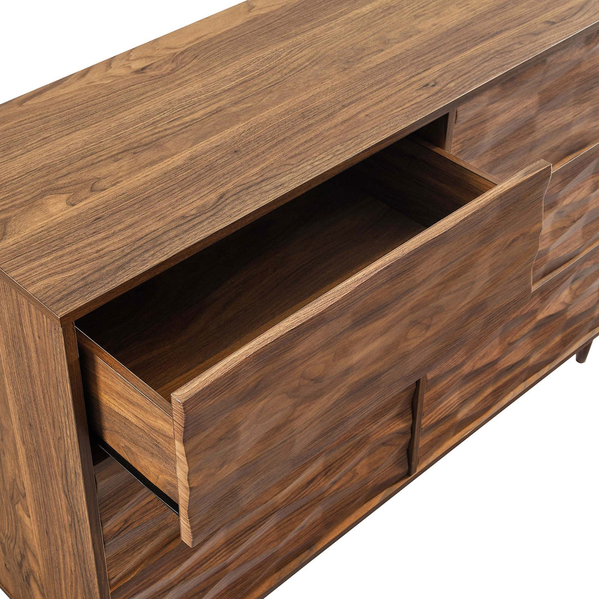 Top drawer of the walnut dresser smoothly glides open, showing the rich wood grain interior storage || MOD-7083-WAL || storage_open_studio